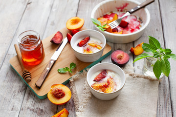  Healthy sweet summer dessert with yogurt plum and peach