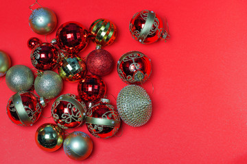 Christmas ornaments decorations background. Classic red glass balls with glitter.