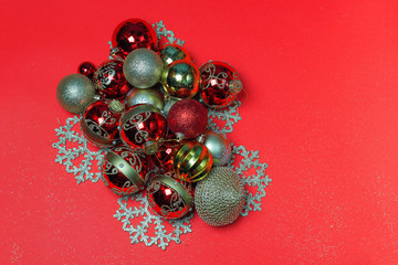 Christmas ornaments decorations background. Classic red glass balls with glitter.