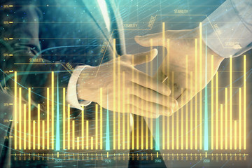 Multi exposure of forex graph on abstract background with two businessmen handshake. Concept of success on stock market