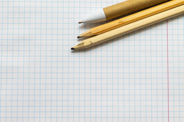  color pencils on a light background to school, beginning  of the school year