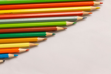  color pencils on a light background to school, beginning of the school year