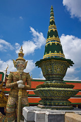 One of six pairs of guardian demon flanking entrance to the Gallery or Phra Rabieng, Wat Phra Kaeo, Bangkok, Thailand