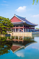 Seoul, South Korea. Geunjeongjeon, Gyeongbokgung Palace, Gyeonghoeru Pavilion and surrounding lake