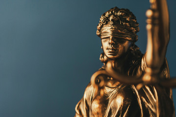 Figure of Justitia or Justice with a blindfold