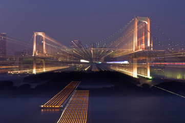 Japan, Tokyo, Odaiba, Rainbow Bridge at Dusk (Zoom Effect)