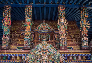 Asia, Nepal, Kathmandu Valley, Patan, multi-armed Hindu goddesses on struts of Minanath Temple