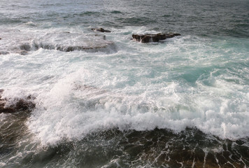 Ocean waves crashing on beach