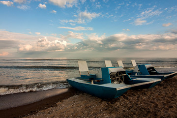 Two catamarans at coastline