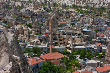 Houses carved into rock formation, Goreme, Cappadocia, Turkey