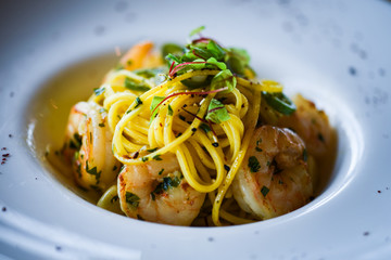 fresh italian pasta with garlic, pepperoni, olive oil & grilled shrimps
