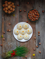 Traditional Azerbaijani holiday cookies shakar chorek on white plate on rustic background