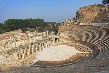 The Great or Grand Theater in the ancient city ruins of Ephesus, Turkey near Selcuk with blue sky...