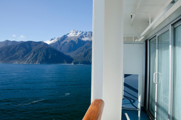 Fototapeta na wymiar New Zealand, South Island, Fiordland National Park, Milford Sound aka Piopiotahi. Dawn Princess cruise ship sailing in Milford Sound.