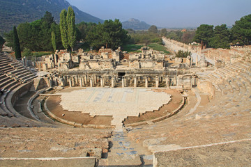 The Great Theater with a view of blue sky, the mountains and Harbour Street in the ancient city ruins of Ephesus, Turkey near Selcuk with blue sky copy space.