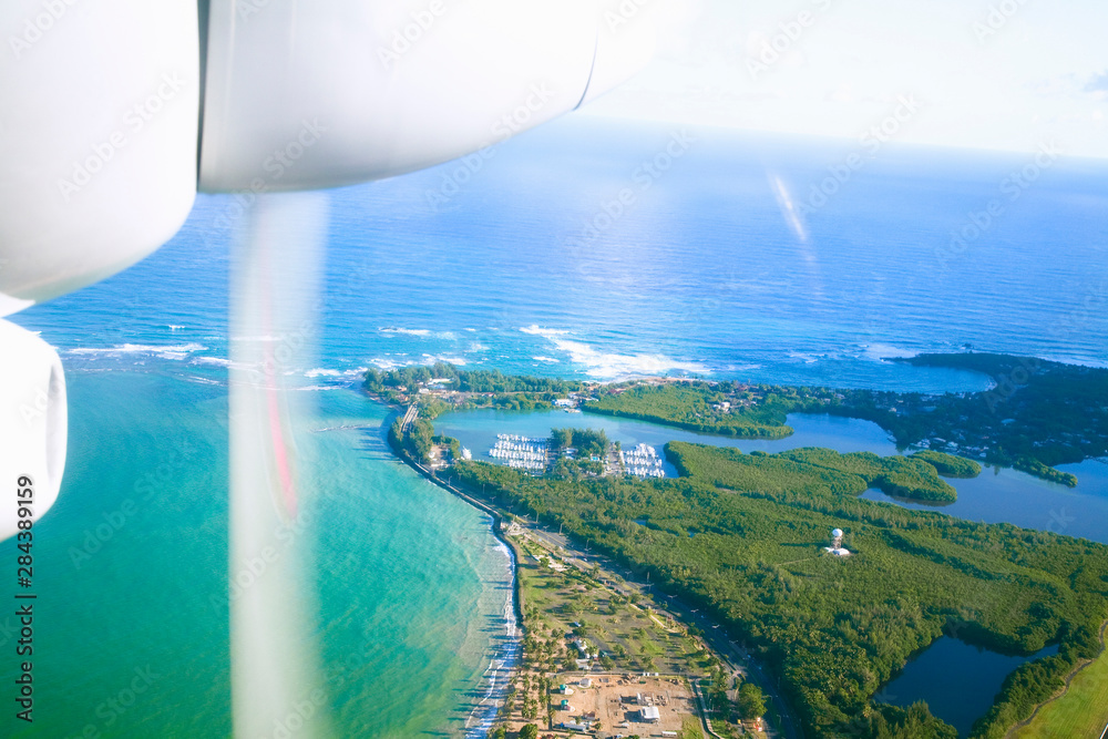 Sticker San Juan, Puerto Rico - A view of the resorts and beaches from an airplane.