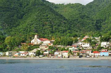 Dominica, Roseau, view of colorful villages south of Roseau on the green hills