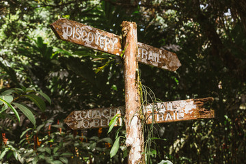 Trinidad, Arima Valley, Asa Wright Nature Center. Aging signpost at nature center.