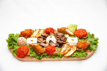 Traditional dish on a wooden plate