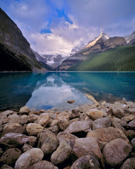 Canada, Alberta, Lake Louise. The still waters of Lake Louise reflect the Canadian Rockies, Banff NP, a World Heritage Site, Alberta, Canada.