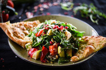 fresh quinoa salad with mix of vegetables & focaccia bread