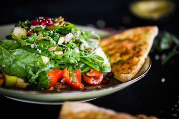 fresh quinoa salad with mix of vegetables & focaccia bread