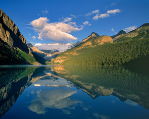 Canada, Alberta, Lake Louise. Victoria Glacier reflects in the mirror-like waters of Lake Louise, in Alberta, Canada's Banff NP, a World Heritage Site.