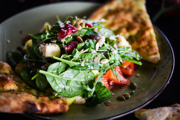 fresh quinoa salad with mix of vegetables & focaccia bread