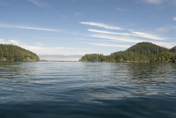 Fototapeta na wymiar Fish Farm off Islet, Queen Charlotte Strait, British Columbia, Canada, August 2006
