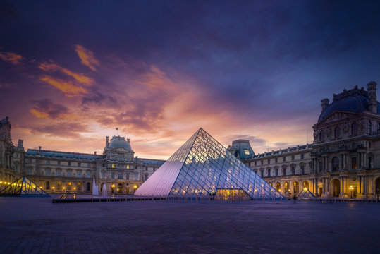 View of famous Louvre Museum with Louvre Pyramid