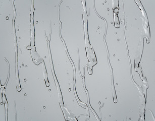 The raindrops and drips on a glass