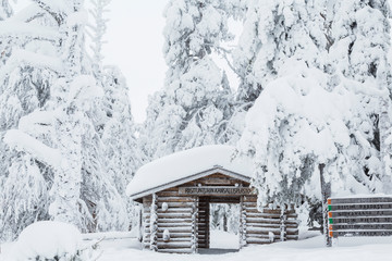 Fototapeta premium Entrance to Riisitunturi National Park, winter, Lapland, Finland