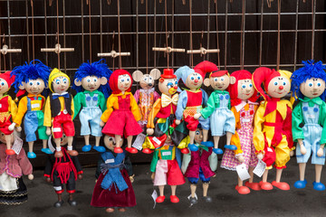 Czech Republic, Prague. Puppets for sale at Havel's Market.