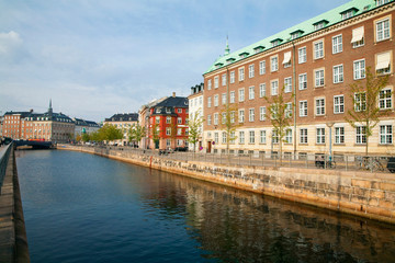 Fototapeta na wymiar Copenhagen, Denmark - A canal running through an old world city.