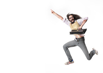 Potrait of a jumping nerd holding a briefcase