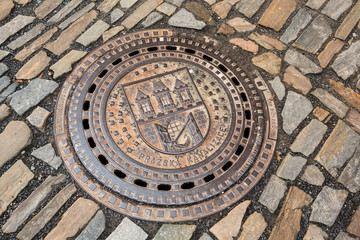 Czech Republic, Prague. Manhole cover in Golden Lane at Prague Castle.