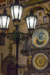 Czech Republic, Prague. Street lamp and Astronomical Clock at night.