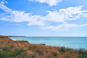 Fototapeta na wymiar coast of the blue sea, landscape of the Sea of Azov