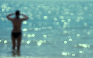 man stands on the seashore