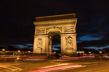 Fototapeta na wymiar Monument Arc de Triomphe along the Avenue Des Champs-Elysees, Paris, France