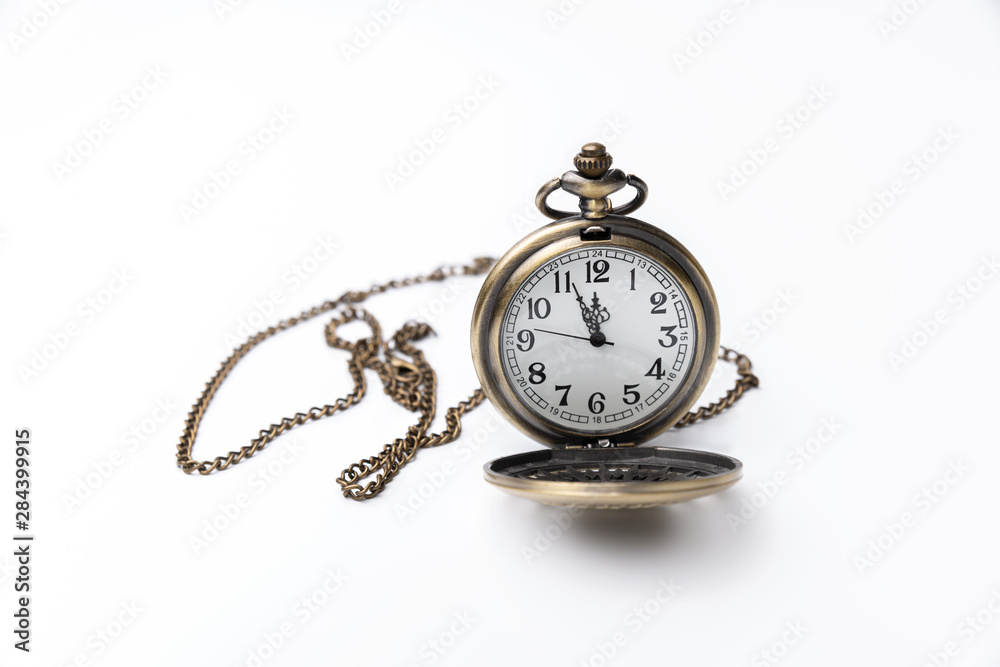 Wall mural old pocket watch closeup isolated on white background