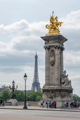 Fototapeta na wymiar Golden statue on Pont Alexandre III, Paris, France, Europe