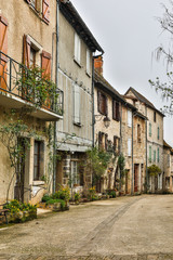 France, Cajarc. Street of homes in the city