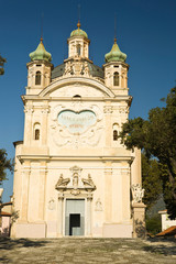 Obraz premium Santuario di Nostra Signora della Costa, The Shrine of Our Lady of the Coast. San Remo, southern coast of Italy. Cathedral originally built in 1630 but additions made over the years.