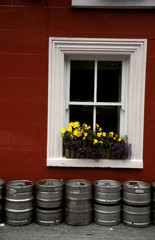 Ireland, Wexlford. Kegs in front of window.