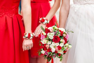 Bouquets of flowers in the hands of the bride and bridesmaids