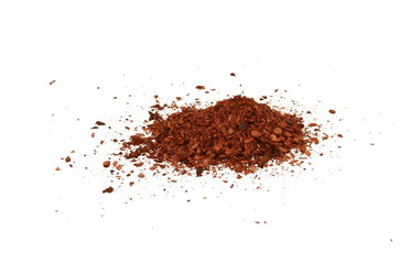 Cayenne pepper. Pile crushed red cayenne pepper, dried chili flakes and seeds isolated on white background