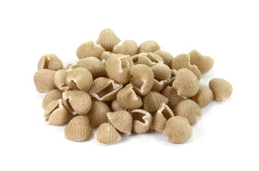 Wholemeal pasta on a white background 