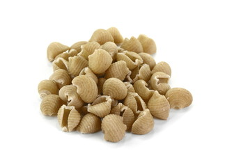 Wholemeal pasta on a white background 