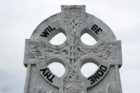 Ireland, County Mayo, Murrisk. Detail of message on Celtic cross.